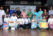 Winners posing for a group photograph with team of adjudicators at University of Jammu on Friday.