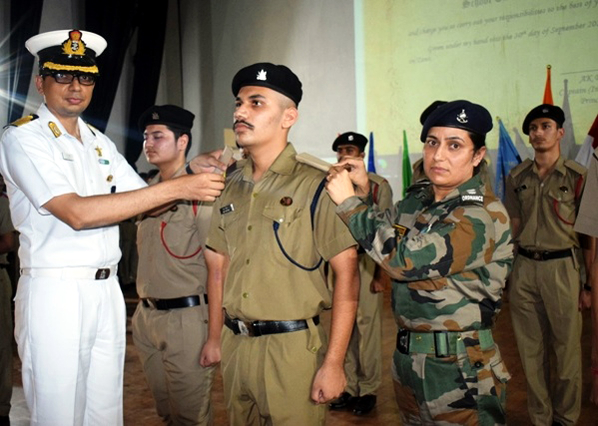 A cadet being pinned during the investiture ceremony at Sainik School Nagrota on Sunday.
