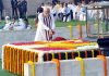 Prime Minister Narendra Modi paying floral tributes at the Samadhi of Mahatma Gandhi on his 153rd birth anniversary, at Rajghat, in Delhi on Sunday. (UNI)