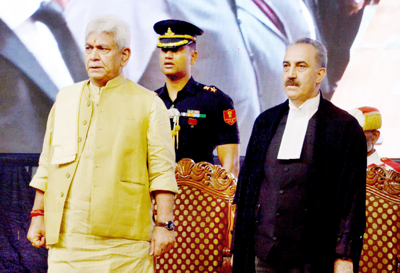 Lt Governor Manoj Sinha administering oath to Justice Ali Mohammad Magrey as Chief Justice at Srinagar on Thursday. -Excelsior/Shakeel Lt Governor Manoj Sinha administering oath to Justice Ali Mohammad Magrey as Chief Justice at Srinagar on Thursday. -Excelsior/Shakeel