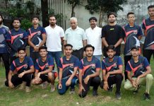 Selected Rollball team posing for a group photograph with Div. Sports Officer, Ashok Singh at Jammu on Wednesday.