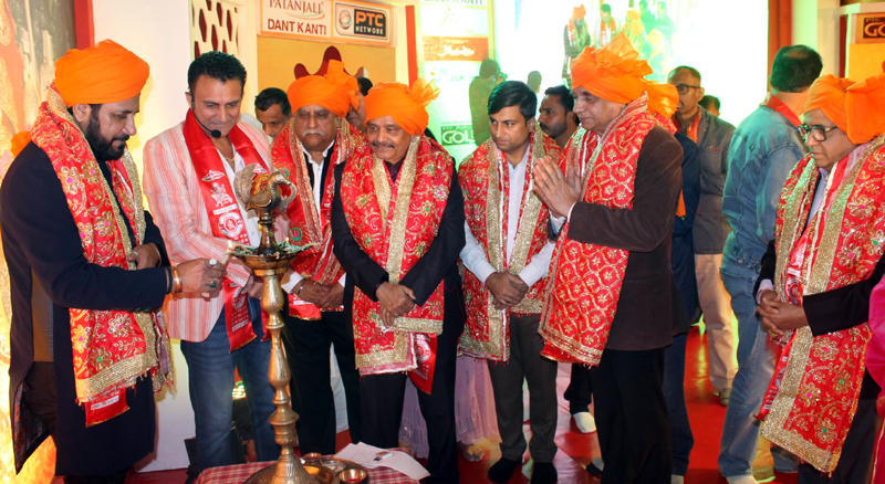 Dignitaries lighting the traditional lamp at Katra during devotional song competition on Wednesday. Dignitaries lighting the traditional lamp at Katra during devotional song competition on Wednesday.
