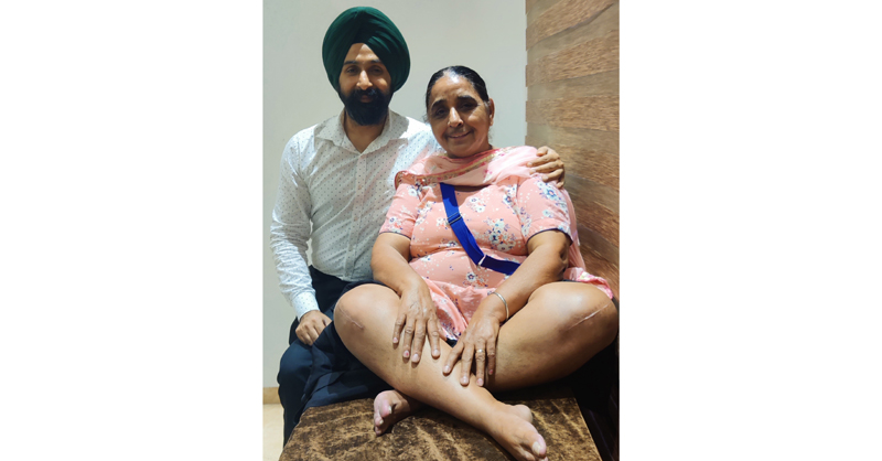 Dr Ranjit Singh posing with a patient on whom he successfully performed knee replacement surgery.