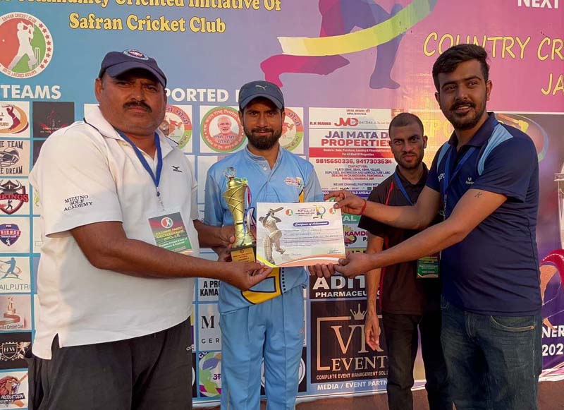 Man of the match award being presented to a winner at Country Cricket Stadium Gharota in Jammu. Man of the match award being presented to a winner at Country Cricket Stadium Gharota in Jammu.