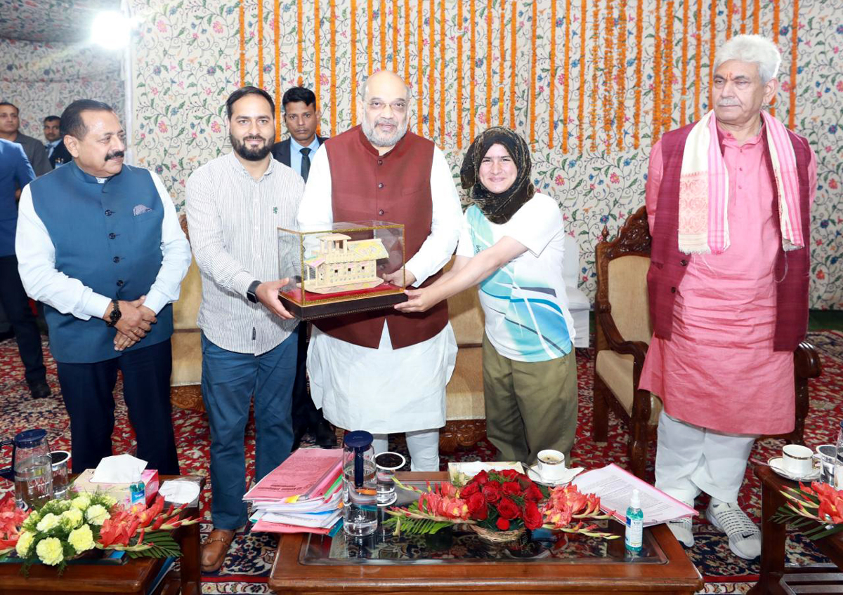 Union Home Minister Amit Shah awarding two-time World Kickboxing Champion and India's talented daughter, Tajamul Islam who is hailing from a small village of Bandipora (Kashmir) and mentioned that Tajamul's achievements at such a young age is an inspiration to every Indian. “My best wishes for her bright future,” said Union Home Minister, Amit Shah on his twitter.