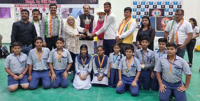 A winner being awarded with trophy by former Minister Surjeet Singh Slathia at Samba on Friday. A winner being awarded with trophy by former Minister Surjeet Singh Slathia at Samba on Friday.