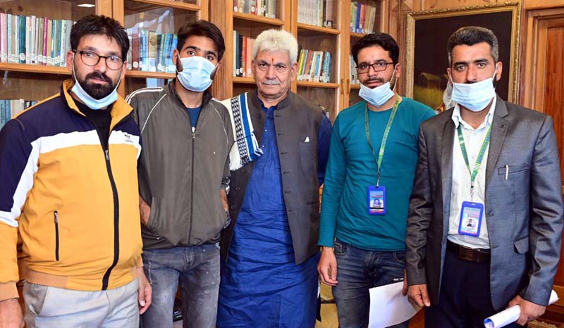 LG Manoj Sinha posing for a group photograph with Sports representatives at Srinagar on Monday. LG Manoj Sinha posing for a group photograph with Sports representatives at Srinagar on Monday.