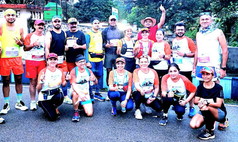 Runners posing for a group photograph at Rishikesh in Uttarakhand on Sunday. Runners posing for a group photograph at Rishikesh in Uttarakhand on Sunday.