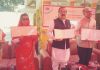 CPG J&K Circle Niraj Kumar along with Ajatshatru Singh (Trustee J&K Dharmarth Trust), Ritu Singh and others releasing PPC on Raghunath Ji Temple.
