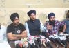 Members of e-Rickshaw Union addressing a press conference at Jammu on Wednesday.