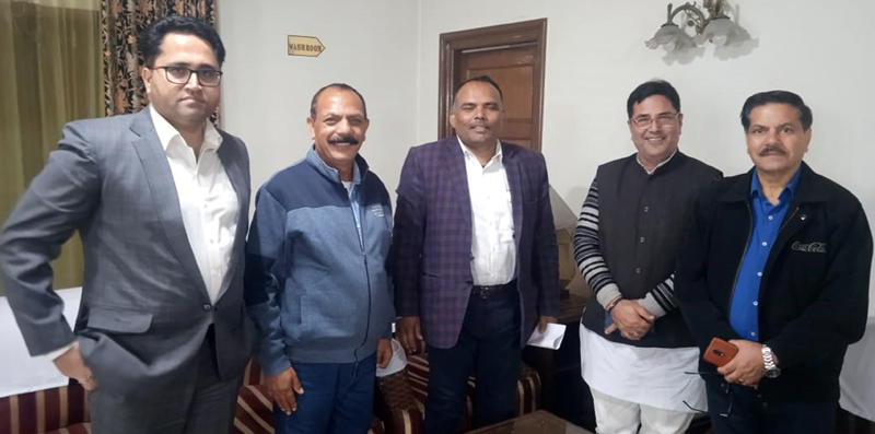 BJP leaders during a meeting with Divisional Commissioner Kashmir, P K Pole at Srinagar on Thursday. BJP leaders during a meeting with Divisional Commissioner Kashmir, P K Pole at Srinagar on Thursday.