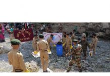 NCC cadets cleaning rivulet Ban Ganga at Katra on Thursday.