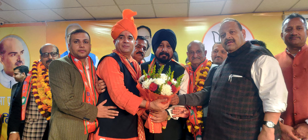 BJP leaders welcoming NC leaders into party on Tuesday.