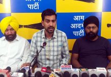 AAP spokesperson Pratap Singh Jamwal addressing a press conference at Jammu on Tuesday.