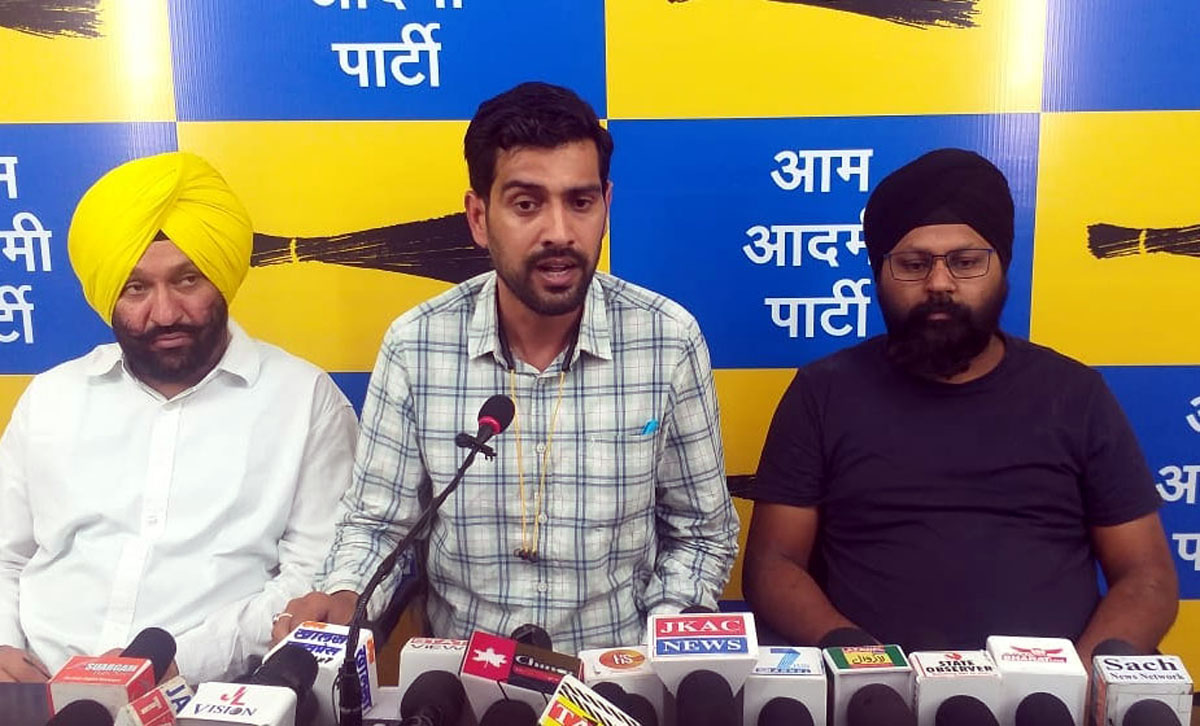 AAP spokesperson Pratap Singh Jamwal addressing a press conference at Jammu on Tuesday.