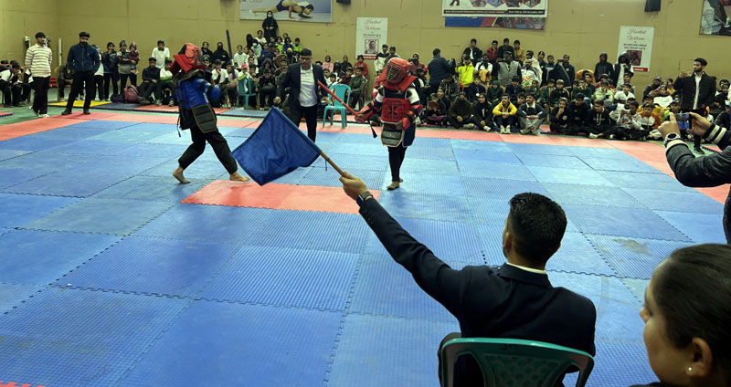 Players in action during the match at Srinagar. Players in action during the match at Srinagar.