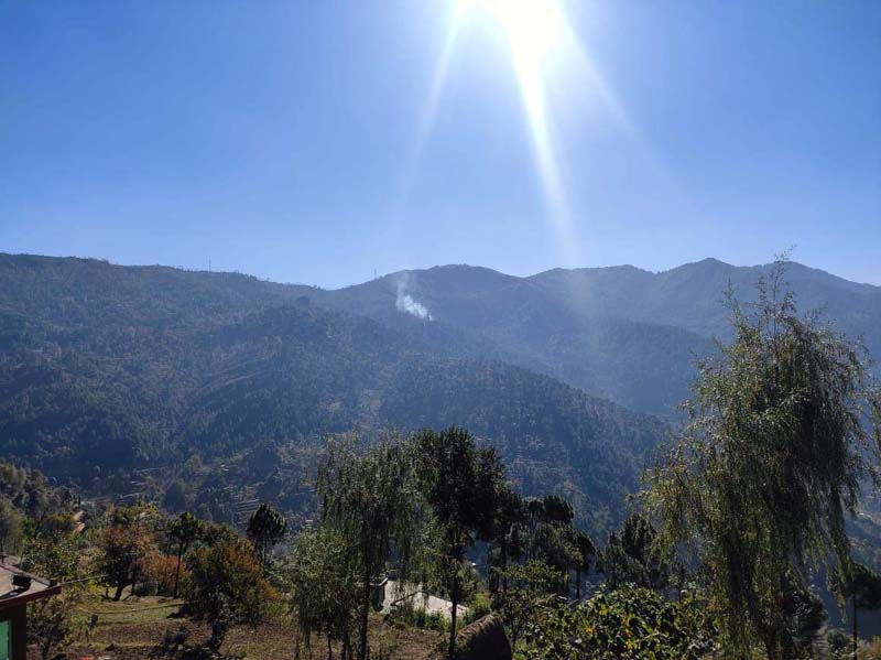 Smoke seen in forest area after speculative firing in Mendhar forests on Thursday. -Excelsior/Rahi Kapoor
