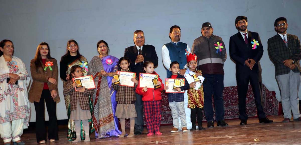 Meritorious students posing with dignitaries during ‘Annual Day’ function of Pushp Vatika at Jammu on Monday.