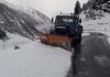 BEACON machine clearing accumulated snow from Srinagar-Leh road at Zojila Pass on Sunday. -Excelsior/Shakeel
