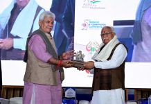 Lieutenant Governor Manoj Sinha presenting a token to Chief Minister of Haryana Manohar Lal Khattar at an event in Katra on Sunday.