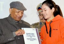 LG Ladakh R K Mathur giving appointment order to a girl in Leh on Tuesday.