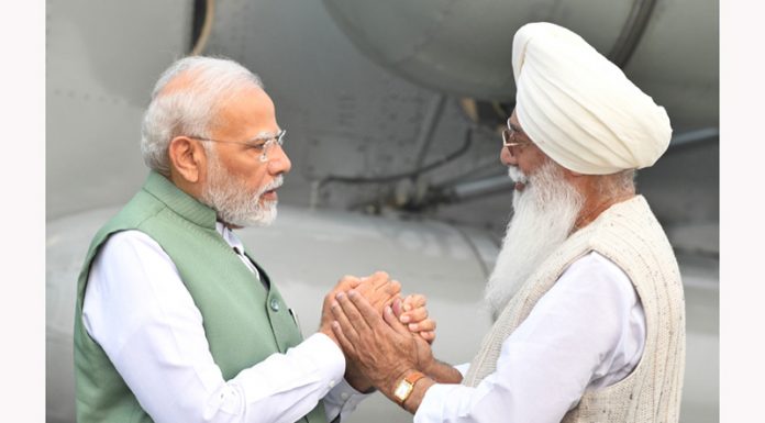 Prime Minister Narendra Modi meeting Baba Gurinder Singh Dhillon during his visit to Radha Soami Satsang Beas in Punjab on Saturday.