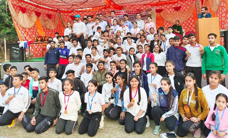 Winners of Silambam Championship posing for a group photograph with dignitaries at Jammu on Sunday. Winners of Silambam Championship posing for a group photograph with dignitaries at Jammu on Sunday.