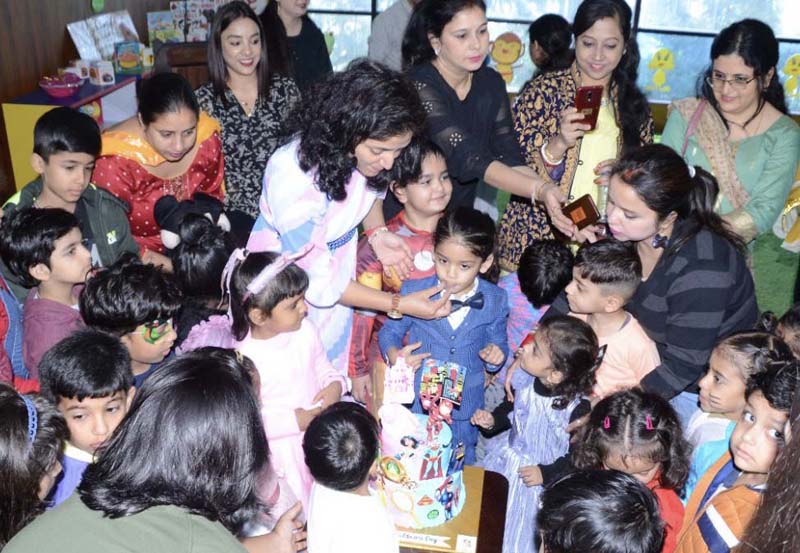 Teachers and students during Children's Day celebrations. Teachers and students during Children's Day celebrations.