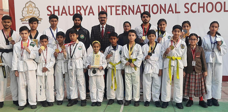 Winners displaying medals with School Principal Dr Rajesh Gandral at Jammu on Thursday. Winners displaying medals with School Principal Dr Rajesh Gandral at Jammu on Thursday.
