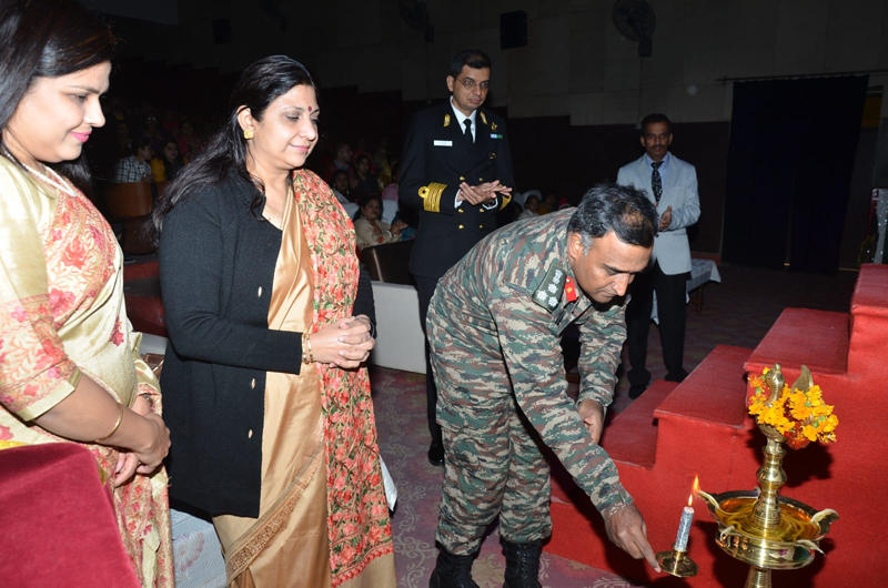 Chief guest, Brig Biju Jacob lighting the traditional lamp at Chinar Primary School Nagrota on Friday.