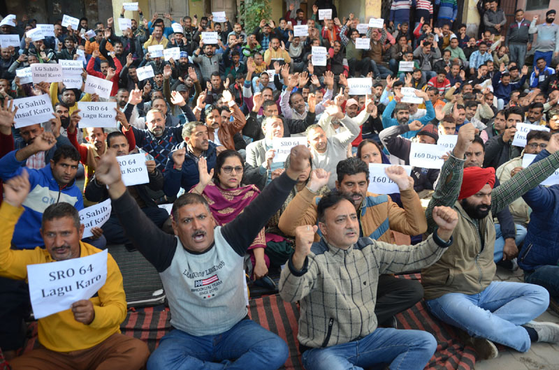 PHE workers staging protest dharna outside Chief Engg's office at B C Road in Jammu on Monday. -Excelsior/ Rakesh PHE workers staging protest dharna outside Chief Engg's office at B C Road in Jammu on Monday. -Excelsior/ Rakesh