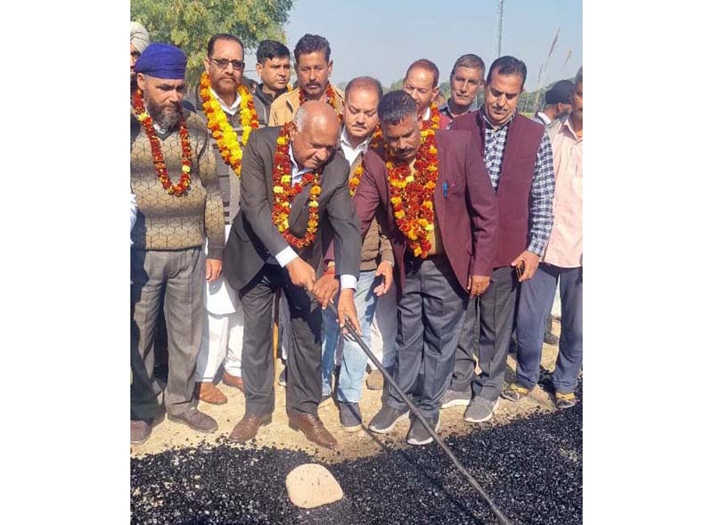 DDC Chairman, Bharat Bhushan kick starting blacktopping of PMGSY road from Rajpura to Jhiri on Sunday. DDC Chairman, Bharat Bhushan kick starting blacktopping of PMGSY road from Rajpura to Jhiri on Sunday.