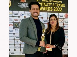 Aradhana Gupta, Promoter and Pranav Gupta, Director receiving Best Family Destination Award for Welcome Hotel, Katra.