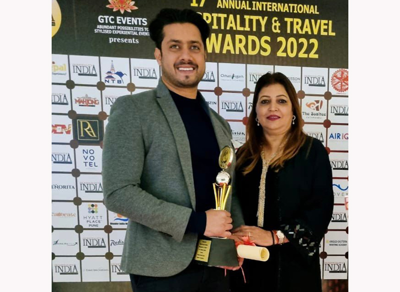 Aradhana Gupta, Promoter and Pranav Gupta, Director receiving Best Family Destination Award for Welcome Hotel, Katra.