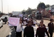 Students of BSc Nursing Colleges Gandhi Nagar and Gangyal during a protest in Jammu on Saturday.