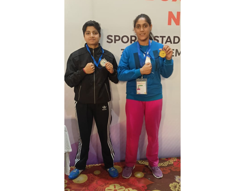 Winners displaying medals after championship Winners displaying medals after championship