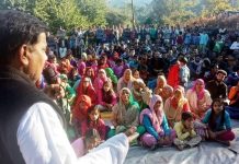 Harsh Dev Singh addressing a public meeting in Chenani Assembly Constituency.