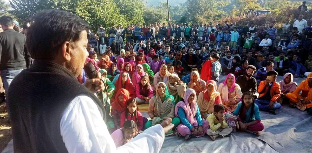 Harsh Dev Singh addressing a public meeting in Chenani Assembly Constituency.