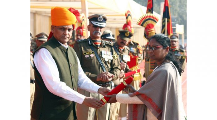 Union Minister of State for Home Affairs Nityanand Rai bestows Police Medals for Gallantry to next of kin of bravehearts who laid down their lives in the line of duty during the BSF Parade in Amritsar on Sunday.