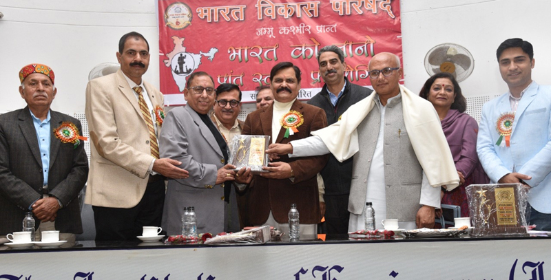 A dignitary being awarded with memento at Jammu on Saturday. A dignitary being awarded with memento at Jammu on Saturday.