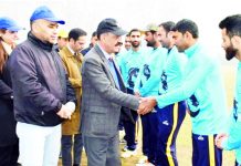 Chief Justice Ali Mohd Magrey interacting with players at Srinagar on Sunday.
