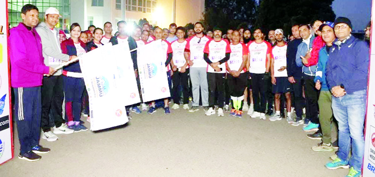 Director Tourism Vivekanand Rai & others flagging off marathon from Gulshan Ground Jammu on Sunday.