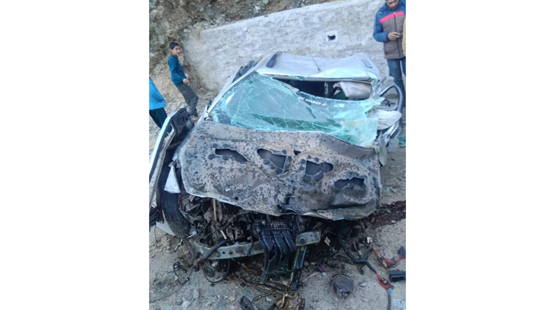 Wreckage of car which met with accident on Chassana-Sangli Kote road in Reasi on Thursday morning. Wreckage of car which met with accident on Chassana-Sangli Kote road in Reasi on Thursday morning.