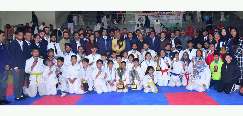 Winners posing with chief guest Mayor Rajinder Sharma and others at Sports Stadium Bhagwati Nagar, Jammu on Sunday. Winners posing with chief guest Mayor Rajinder Sharma and others at Sports Stadium Bhagwati Nagar, Jammu on Sunday.