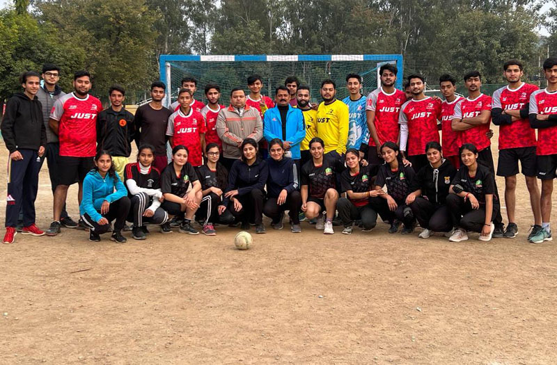 Handball team (Men & Women) posing for group photograph. Handball team (Men & Women) posing for group photograph.