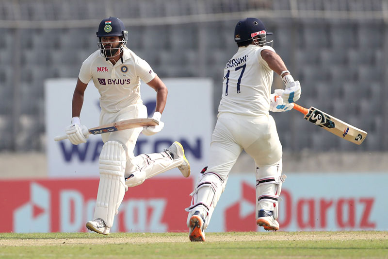 India's Rishabh Pant and Shreyas Iyer walk between the wickets during the second day of the second Test against Bangladesh in Mirpur on Friday.