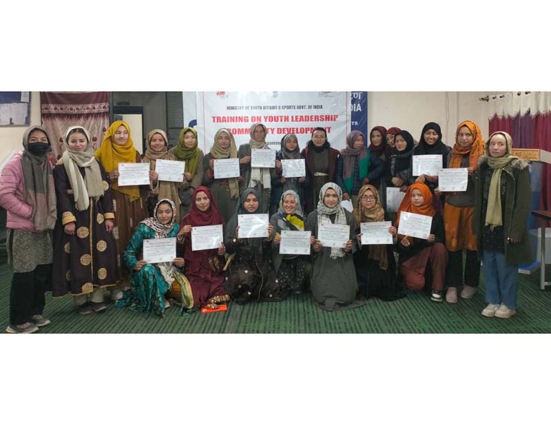 Participants of a training programme in Kargil posing for a group photograph with their certificates. -Excelsior/Basharat Ladakhi Participants of a training programme in Kargil posing for a group photograph with their certificates. -Excelsior/Basharat Ladakhi