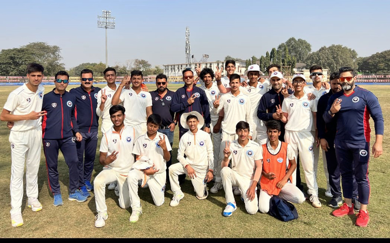 J&K cricket team posing with coaches after registering big win over Mizoram in Vijay Merchant Trophy match at Bhillai.