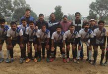 Winning team posing with match officials at GGM Science College Ground, Jammu.