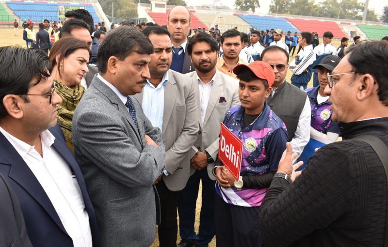 Chief Secretary Arun Kumar Mehta interacting with players from Delhi at MA Stadium, Jammu.